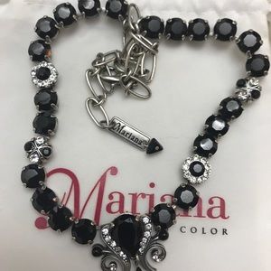 Mariana.   Beautiful black necklace
